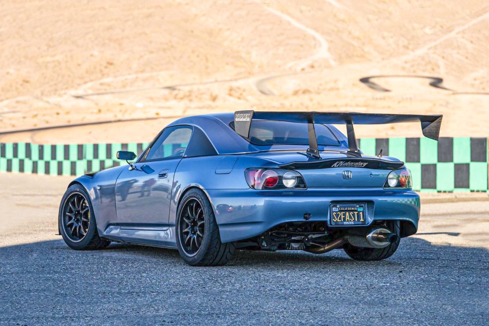 https://uploads.builtforbackroads.com/uploads/2022/06/2022.06.29-HONDA-S2000-2002_1.jpg